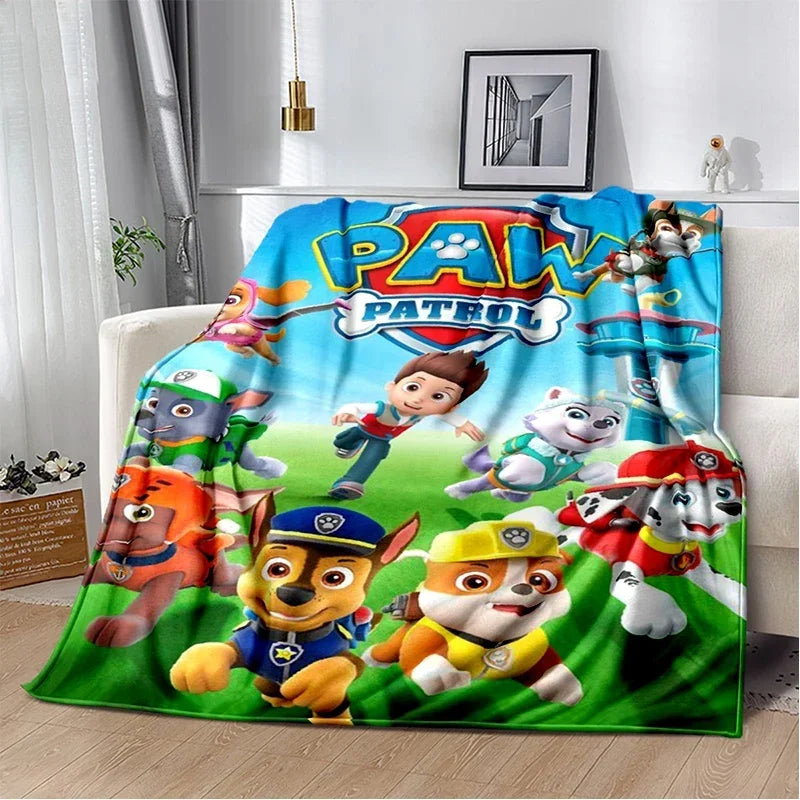 Couverture plaid Pat' Patrouille multicolore avec personnages Ryder, Marshall et autres