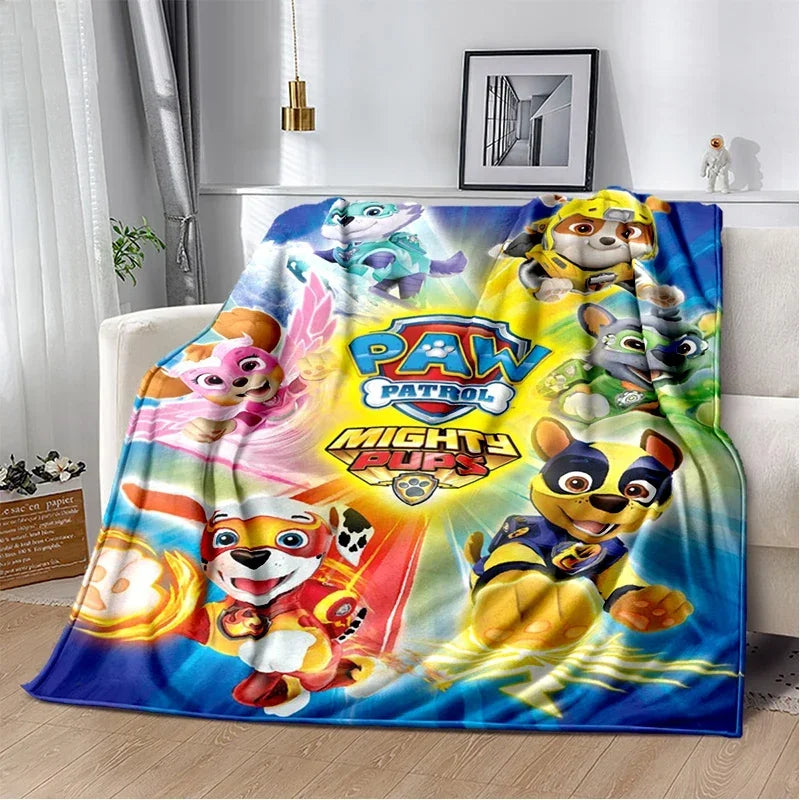 Couverture plaid colorée Pat' Patrouille avec personnages et texte « Mighty Pups »