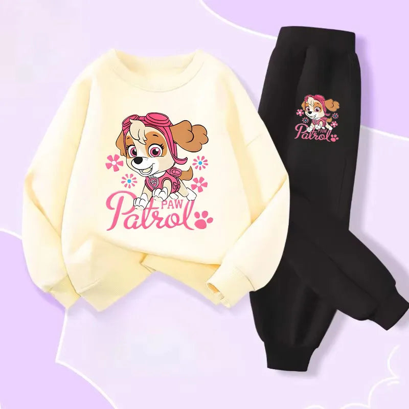Ensemble fille Pat Patrouille : sweat écru et pantalon noir, motif Stella.
