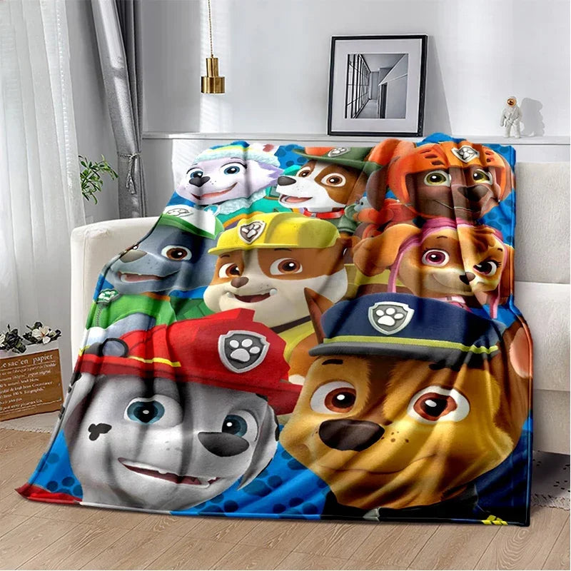 Couverture bleu à portraits de chiots animés, motifs multicolores