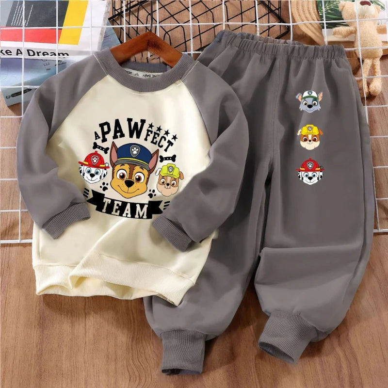 Ensemble Pat' Patrouille sweat écru Pawfect Team, pantalon et manches marron, chiots imprimés sur la jambe