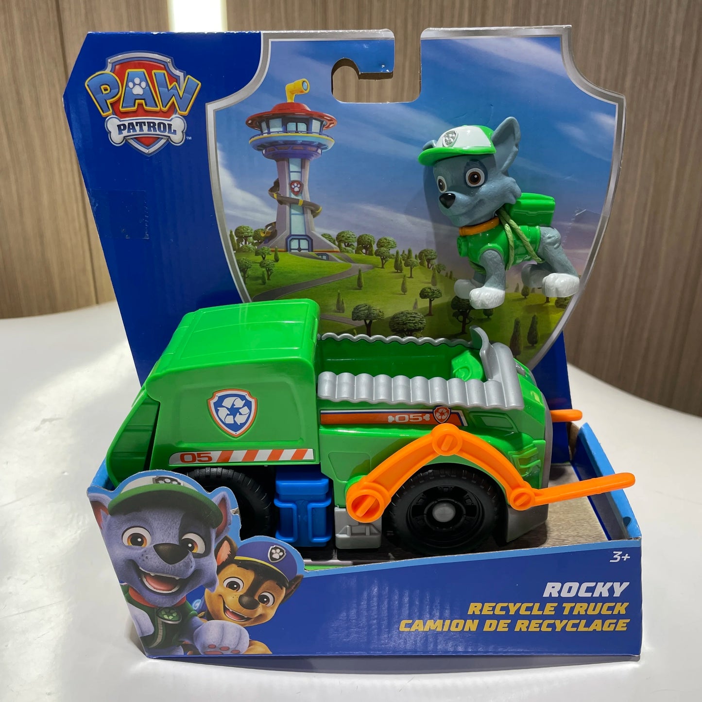 Camion de recyclage jouet Rocky Pat' Patrouille, emballé, camion vert et figurine.