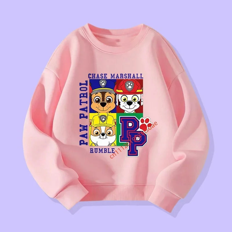 Pull rose Pat Patrouille, imprimé Chase Marshall avec badge et pattes multicolores.