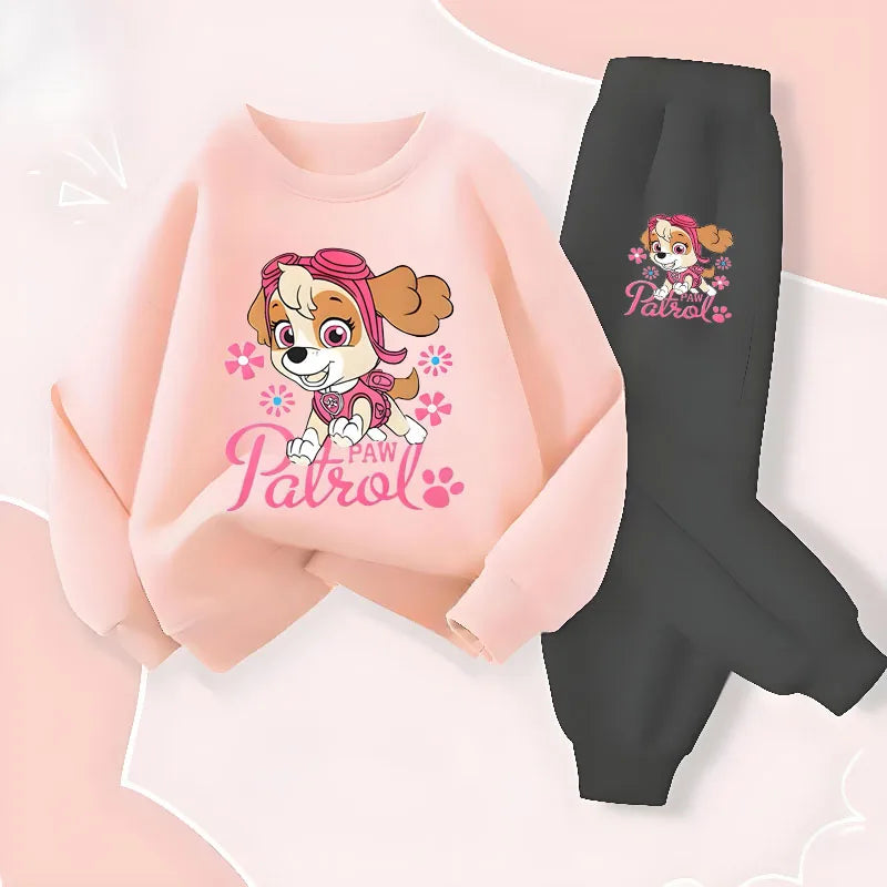 Ensemble fille Pat Patrouille : sweat rose pâle et pantalon noir, motif Stella.