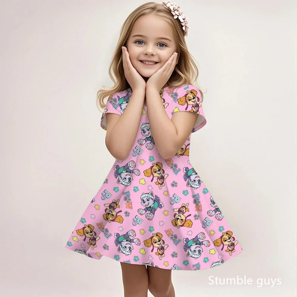 Robe enfant rose à motifs personnages dessinés, manches courtes et évasée