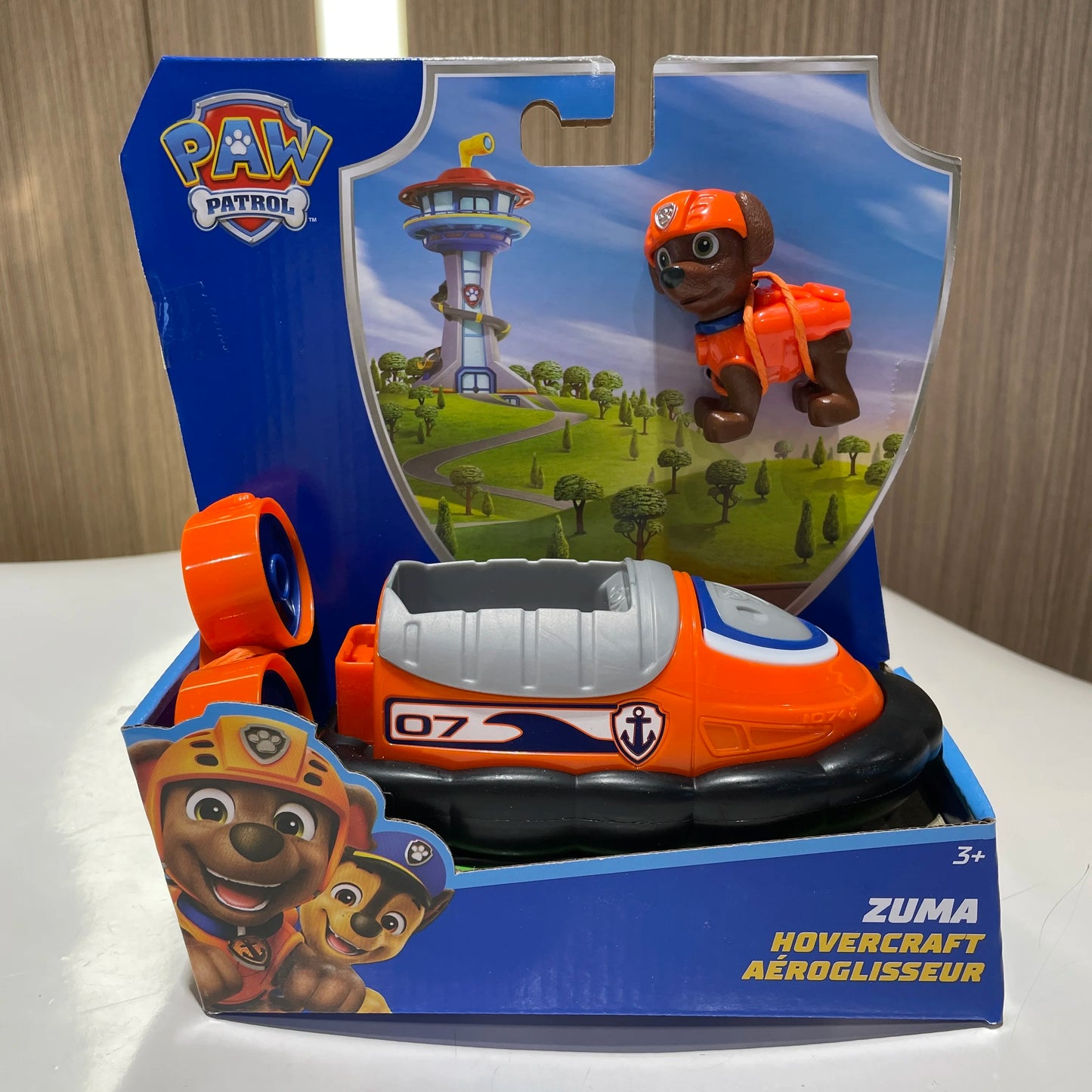 Boîte jouet Pat Patrouille : aéroglisseur Zuma orange avec accessoires