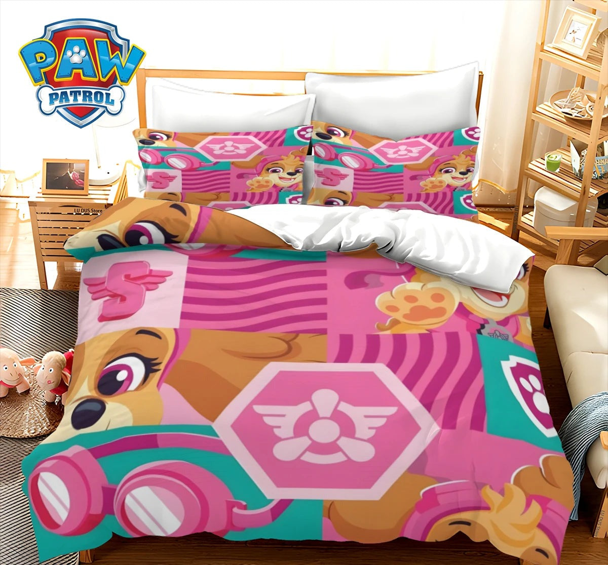 Parure de lit rose patchwork Pat' Patrouille avec motifs chiens, pattes et fleurs
