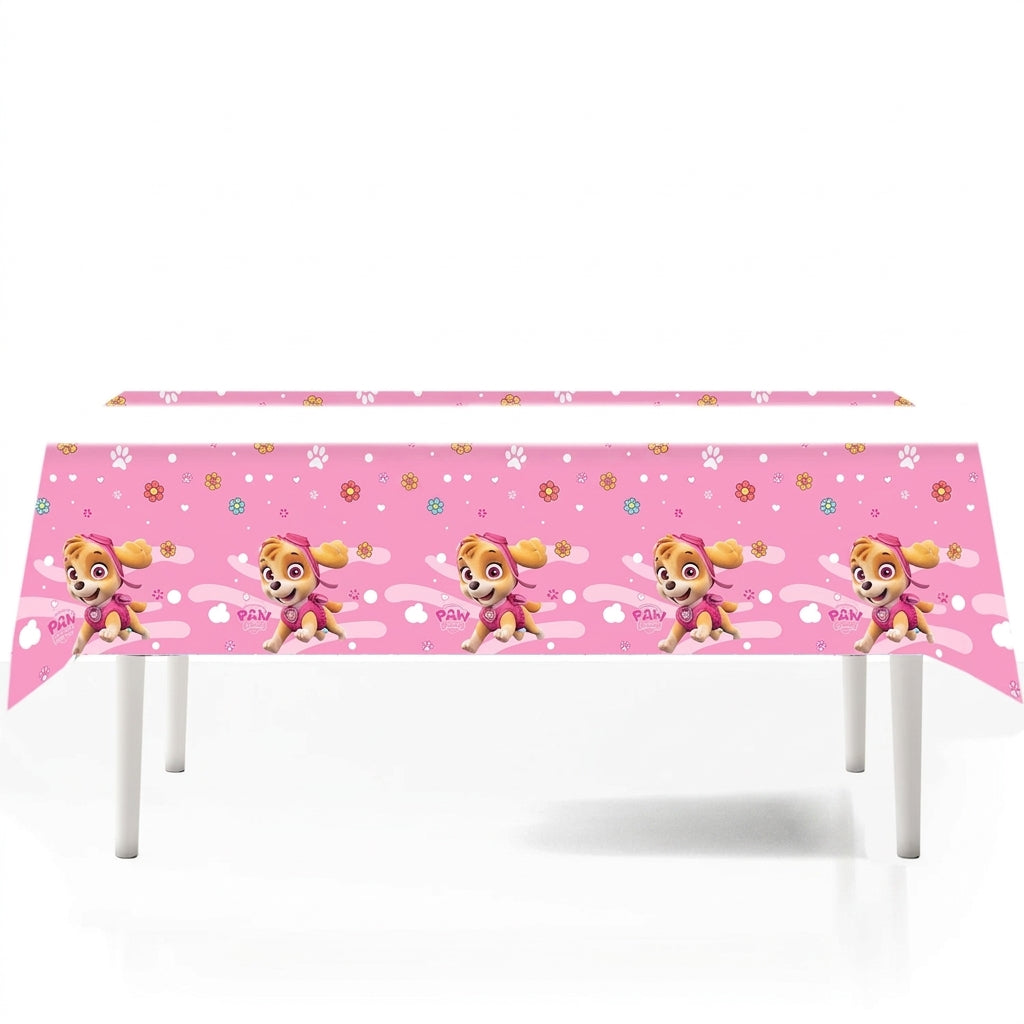 Nappe Pat' Patrouille rose 108 × 180 cm à frise Stella et Everest, dressée sur une table d'anniversaire