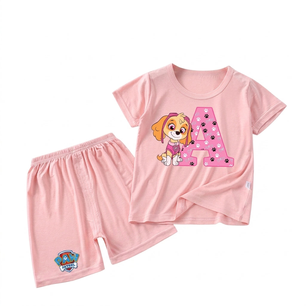 Pyjama enfant Pat' Patrouille rose motif Stella, lettre à choisir, porté par un enfant